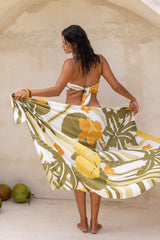 Large scale retro palm print sarong olive green colourway worn with our signiture wrap tied up 70s style as a boob tube  100% rayon  chunky bangles to compliment