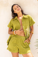 Vintage inspired terry towelling, elasticated shorts with side splits and 70s patch pockets.