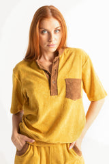 70s style retro terry towelling luxe tracksuit. This leisure set is made for lounging and looking fabulous. Mustard with brown retro spliced stand-up collar and retro pocket details. Cotton medium weight terry fabric with 2% elastane