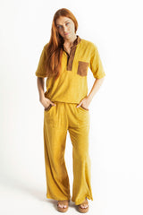 70s style retro terry towelling luxe tracksuit. Mustard with brown retro spliced stand-up collar and retro pocket details. Cotton medium weight terry fabric with 2% elastane