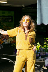 70s style retro terry towelling luxe tracksuit. Mustard with brown retro spliced stand-up collar and retro pocket details. Cotton medium weight terry fabric with 2% elastane