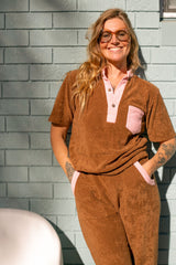 70s style retro terry towelling luxe tracksuit. Mocha brown with pink spliced retro stand-up collar and pocket details. Cotton medium weight terry fabric with 2% elastane