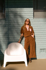 70s style retro terry towelling luxe tracksuit. Mocha brown with pink spliced retro stand-up collar and pocket details. Cotton medium weight terry fabric with 2% elastane