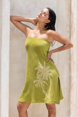 This vintage inspired strapless terry towelling dress, with its elasticated top, slips on effortlessly. Olive green and finished with our signature screen-printed palm design and a chic side split, it’s a timeless piece with a touch of sophistication. Made in a cotton / elastane blend.