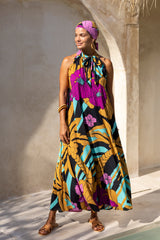 Large scale retro palm print flowy summer maxi dress with open v neck that can also tie up to halter neck 100% rayon black magenta and aqua colourway with matching head wrap and bamboo earrings