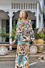 Vintage inspired A-line high waist maxi skirt in a large scale floral print in blues and mustard with a cream  background