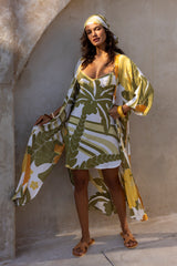 Large scale retro palm print button up robe  with side splits and tie 70s style batwing sleeves this midi length dress can also be worn as a kaftan olive green colourway 100% rayon