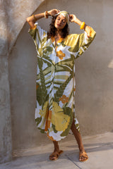 Large scale retro palm print button up robe  with side splits and tie 70s style batwing sleeves this midi length dress can also be worn as a kaftan olive green colourway 100% rayon